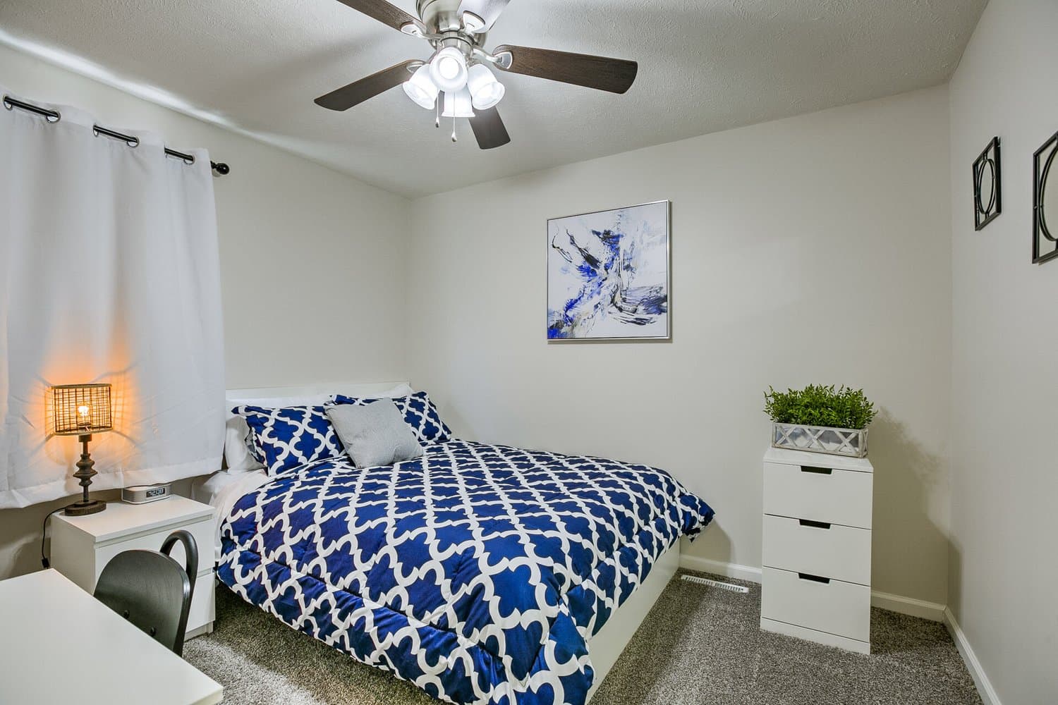 Bedroom staged by Acorn Home Staging — Vacation Rental Design